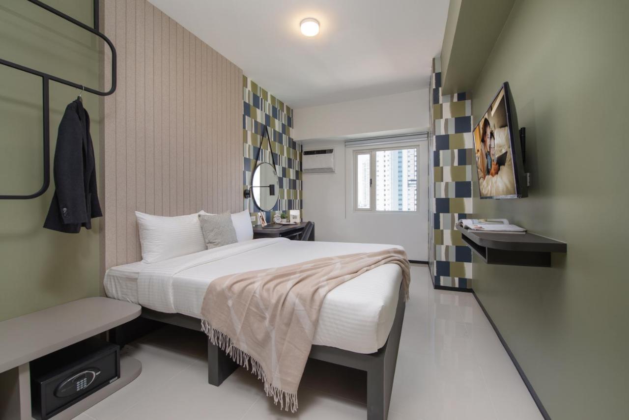 The Suites At Torre Lorenzo Malate - Managed By The Ascott Limited Манила Экстерьер фото